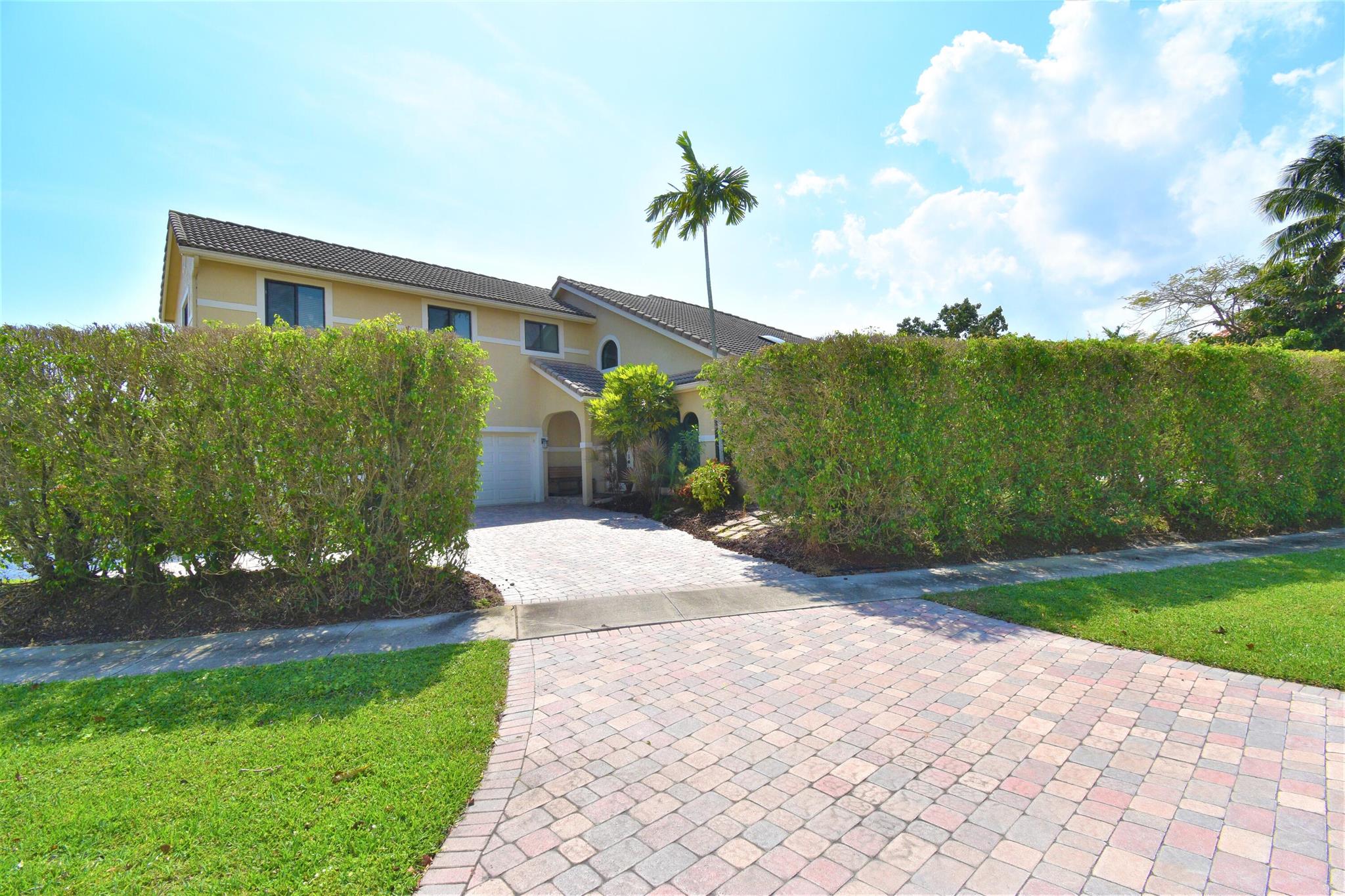 Montoya Circle, Boca Hamlet two level great home. Six Bedroom five bathroom pool home. master on second floor. Modern kitchen Granite countertops wooden cabinets, two dishwashers double sink. marble floors in the living area. All new wooden floors upstairs and on the stairway. All impact Windows, and sliders throughout the house. Second floor patio outside the master bedroom. Professional basketball court in the backyard with a full batting cage, large circular. Driveway for easy access. Three car garage and much more best location. This house should not be missed!
