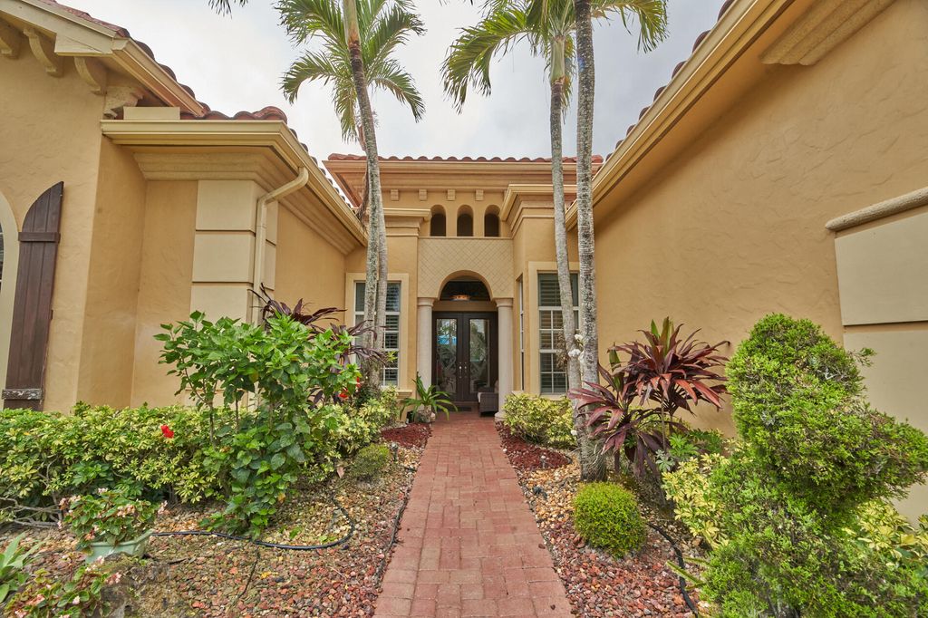 Photo of 3405 Lago De Talavera, Lake Worth, FL 33467 (MLS # R11077750)