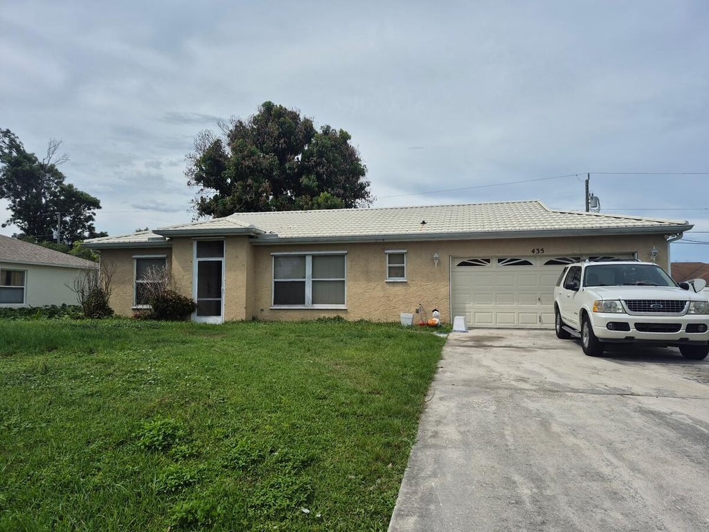 Photo of 435 SW KABOT Avenue, Port Saint Lucie, FL 34953 (MLS # B26074492)