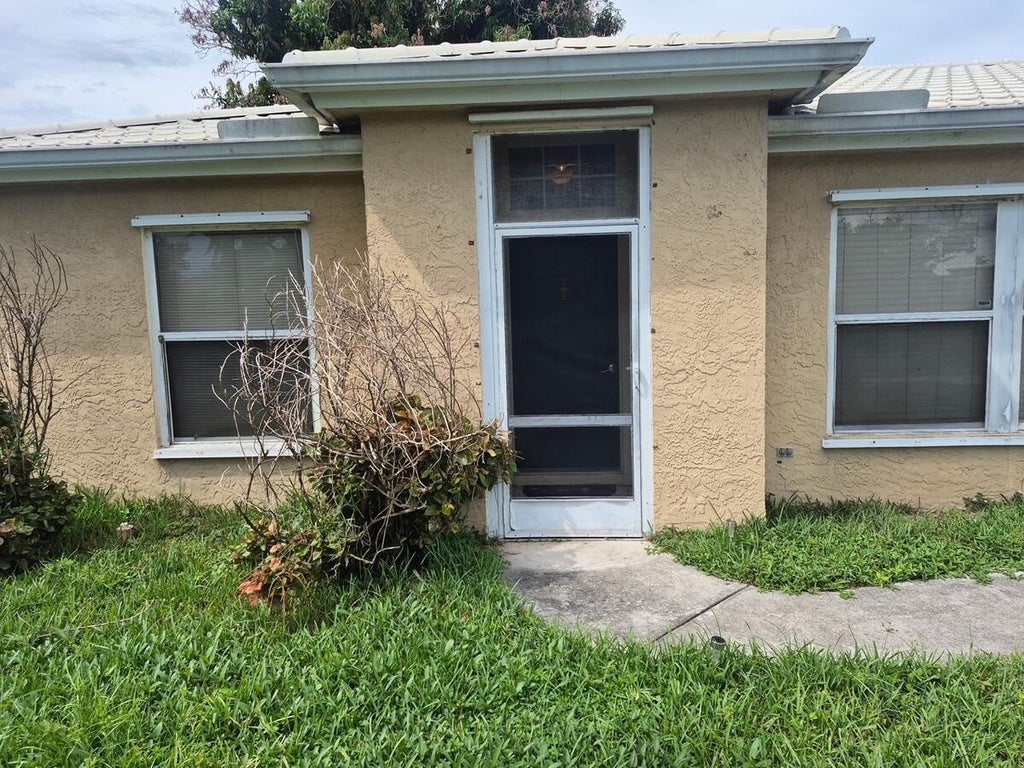 Photo of 435 SW KABOT Avenue, Port Saint Lucie, FL 34953 (MLS # B26074492)