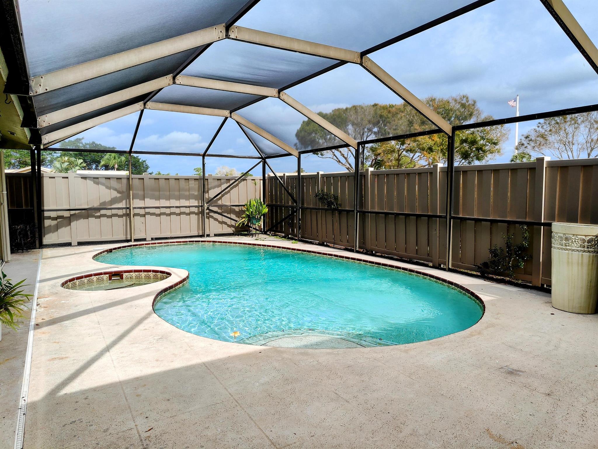 Nicely renovated single story home with updated kitchen, including quartz counter tops and stainless appliances. 3 bedrooms, 2 baths and 1,300 square feet of living space. You get your very own private pool/spa with completely screened patio which is perfect for entertaining and enjoying the Florida weather day or night. Accordion hurricane shutters throughout. It features a Metal roof, vaulted ceilings with skylights, and newer washer and dryer. This great home can come with the furniture included or the landlord will remove the furnishings upon request. Internet and basic Cable included. Parking spots are 4 and 7. This one cannot be missed. Go see it today! The community also offers additional community pools, tennis, basketball, jogging, biking and playground areas.