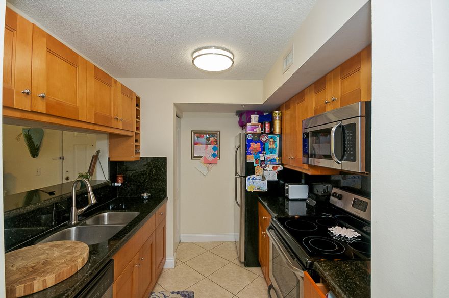 FRESHLY PAINTED, Ground floor pool view, 2 Bedrooms 1 bath Capri floor plan completely renovated with tile floors throughout, granite countertops, newer appliances, newer AC and water heater. Pet friendly unit at Resort Style Yacht Club on the intracoastal. *** AVAILABLE NOW*** WATER & BASIC CABLE INCLUDED.