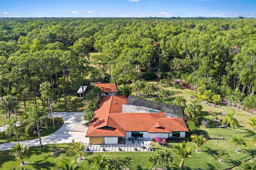 Photo of 11845 165th Road N, Jupiter, FL 33478 (MLS # R11156722)