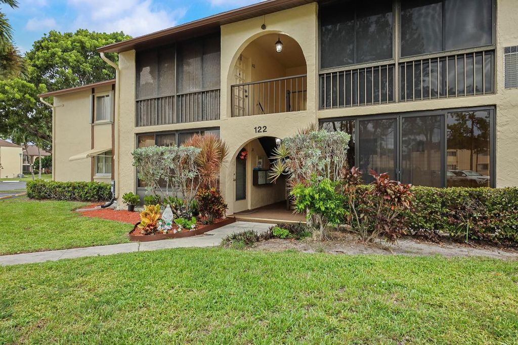 Photo of 122 Lake Pine Circle #A-1, Greenacres, FL 33463 (MLS # R11122167)