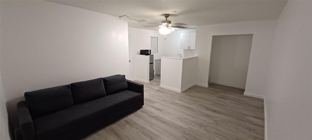 Spacious efficiency in the beautiful Tamarac family community of Woodmont with separate entrance. Kitchen with small frig, microwave & 2-burner cooktop stove. Nice size closet. Laminate flooring. Move-in ready. Rent includes water & electric. One occupant. No pets. No smokers. No evictions. Parking for 1 car only. Rapid Approval.