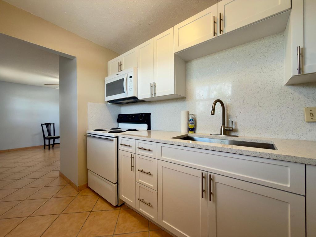 Photo of 200 Bonnie Boulevard #132, Palm Springs, FL 33461 (MLS # B26025073)