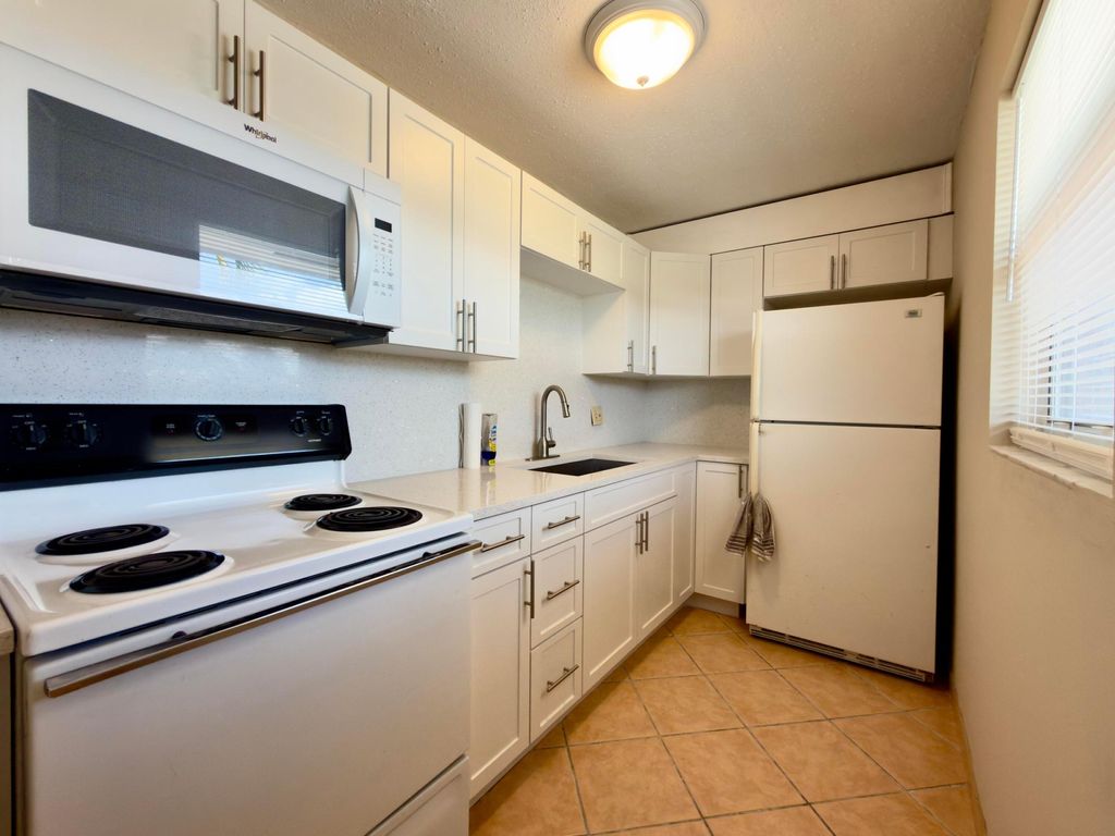 Photo of 200 Bonnie Boulevard #132, Palm Springs, FL 33461 (MLS # B26025073)