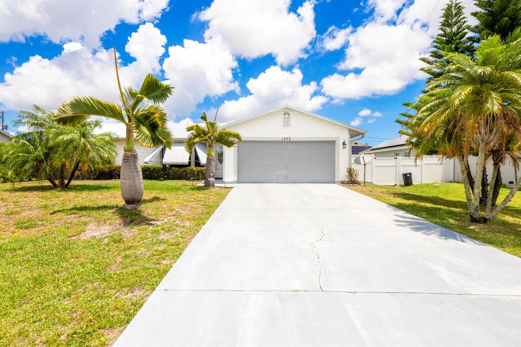 Photo of 1253 SW Asturia Avenue, Port Saint Lucie, FL 34953 (MLS # R10990137)