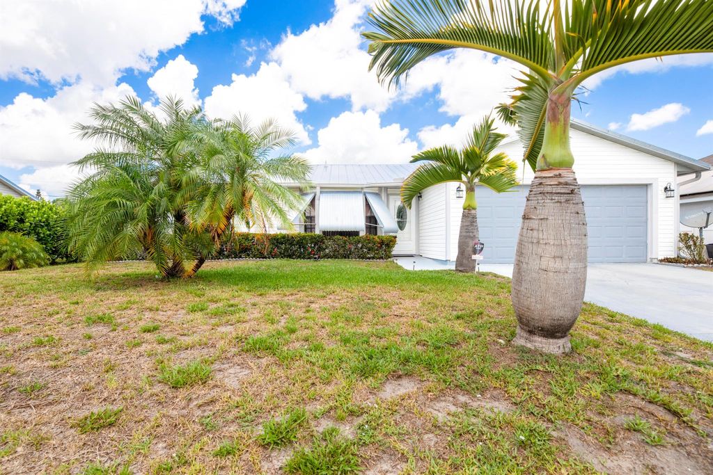 Photo of 1253 SW Asturia Avenue, Port Saint Lucie, FL 34953 (MLS # R10990137)