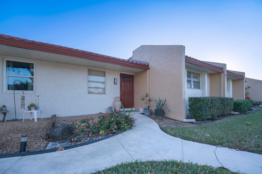 Photo of 438 Lake Carol Drive, West Palm Beach, FL 33411 (MLS # R11163806)