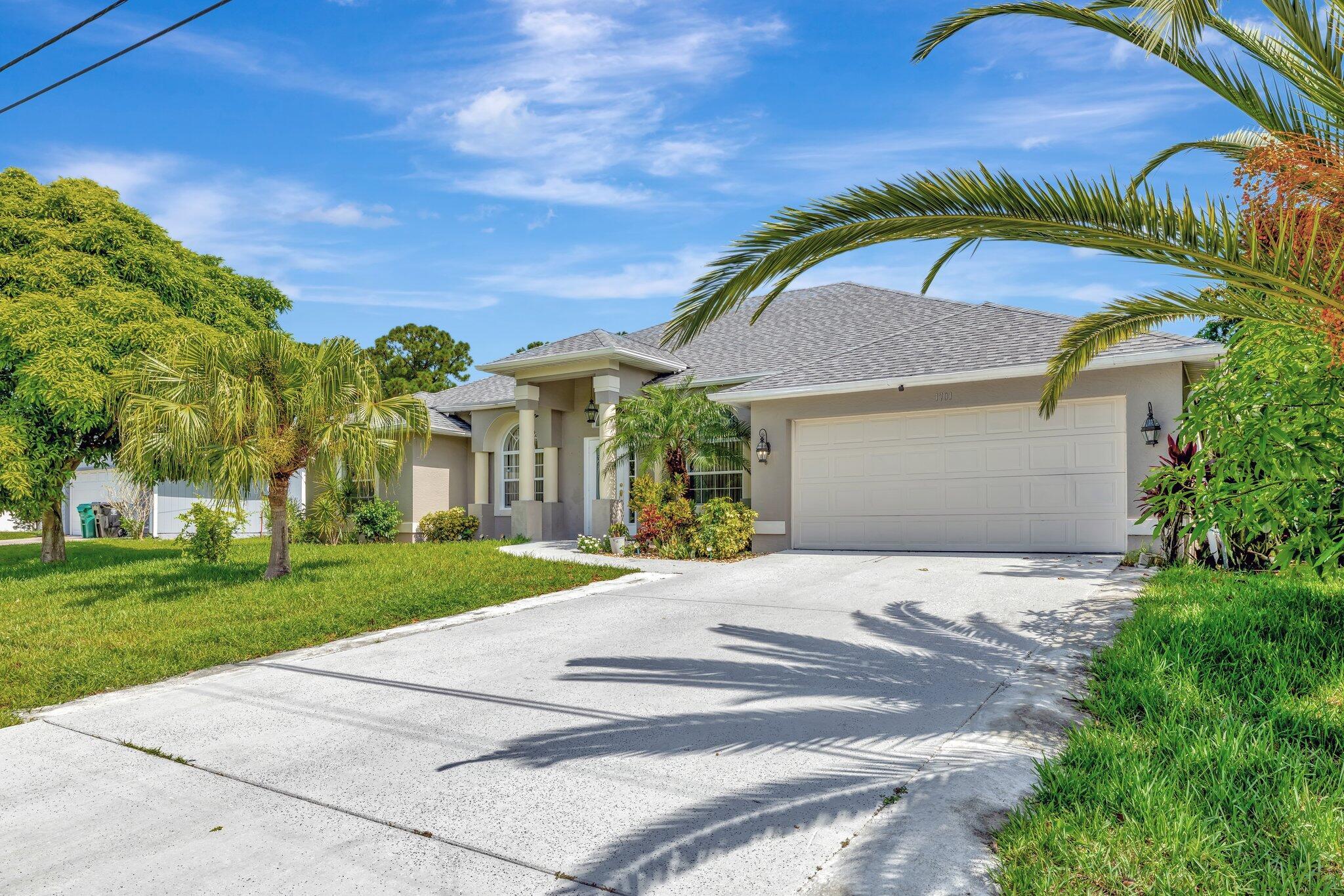 Take a look at this lovely Pool Home 4 bedroom 3 bath 2 car garage with a den home located in the Treasure Coast community. New roof, newer AC and water heater, The primary suite features high ceiling, sliding doors leading to enclosed patio which can be used as an office., walk-in closets. Primary bathroom includes a large wall in shower, new soaking jacuzzi tub, and dual vanity sinks. Large bedroom in the back which gives you privacy with a pocket door enclosure including bathroom. This home also offers a formal dining area, The kitchen included stainless steel appliances, new cabinets, granite counter tops, separate laundry room, shed in yard for storage