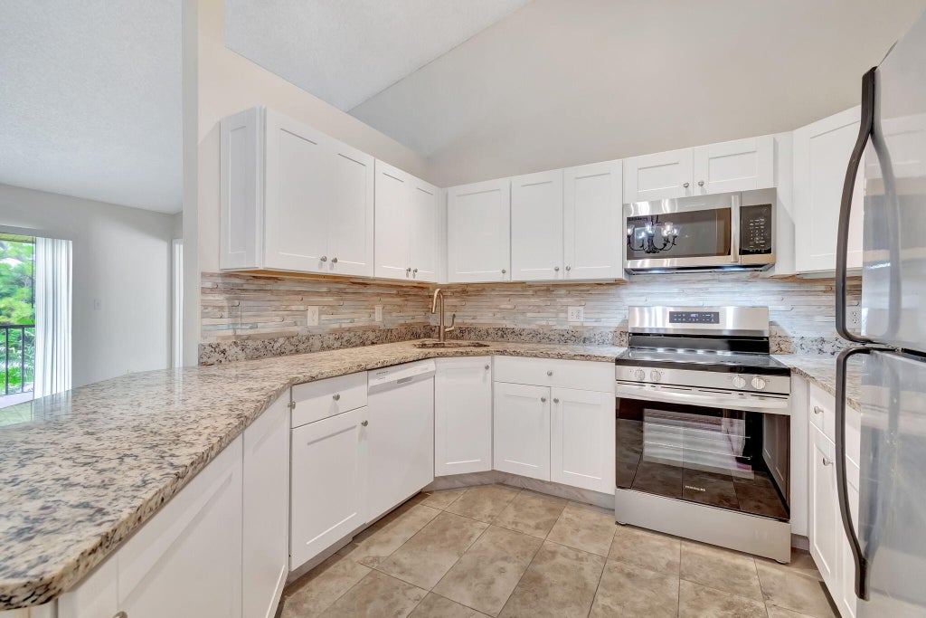 Photo of 6527 Chasewood Drive N #G, Jupiter, FL 33458 (MLS # R11021391)