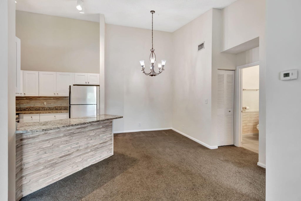 Photo of 6527 Chasewood Drive N #G, Jupiter, FL 33458 (MLS # R11021391)