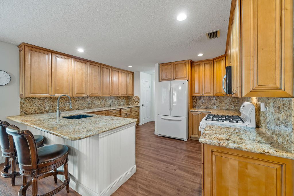 Photo of 1223 Baycourt Isle, Greenacres, FL 33413 (MLS # R11103381)