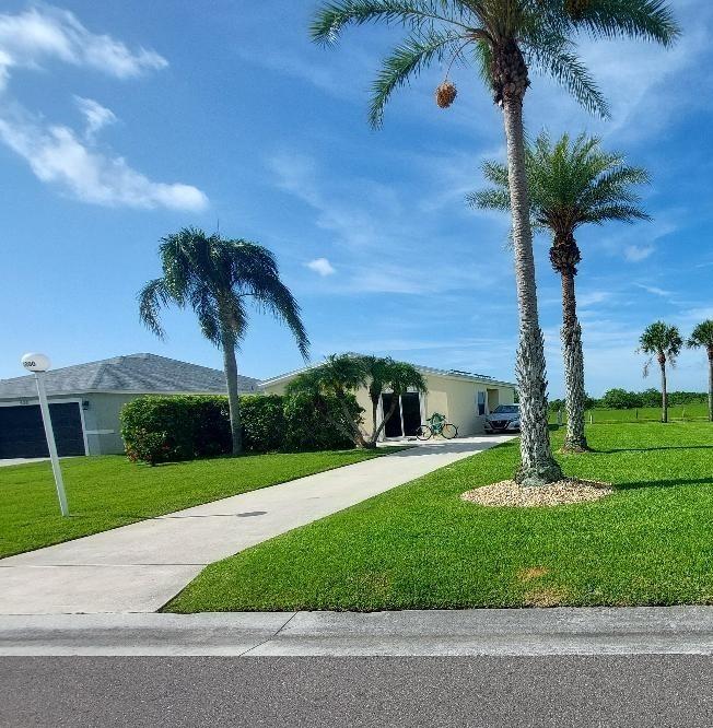 Charming CBS home in Palm Village Ranch. This community is close to shopping, and has everything that a retiree could ever want, including close to fishing and boating in Lake Okeechobee. Palm Village has a heated pool, beautiful clubhouse, lots of activities for everyone, including card games, dances, water aerobics, crafts and potlucks. Low monthly HOA fee covers lawn service and trash and escrow reserves fund, insurance on pool, maintenance of clubhouse grounds, pool maintenance. This home has a metal roof and new hot water heater. NO STAIRS.