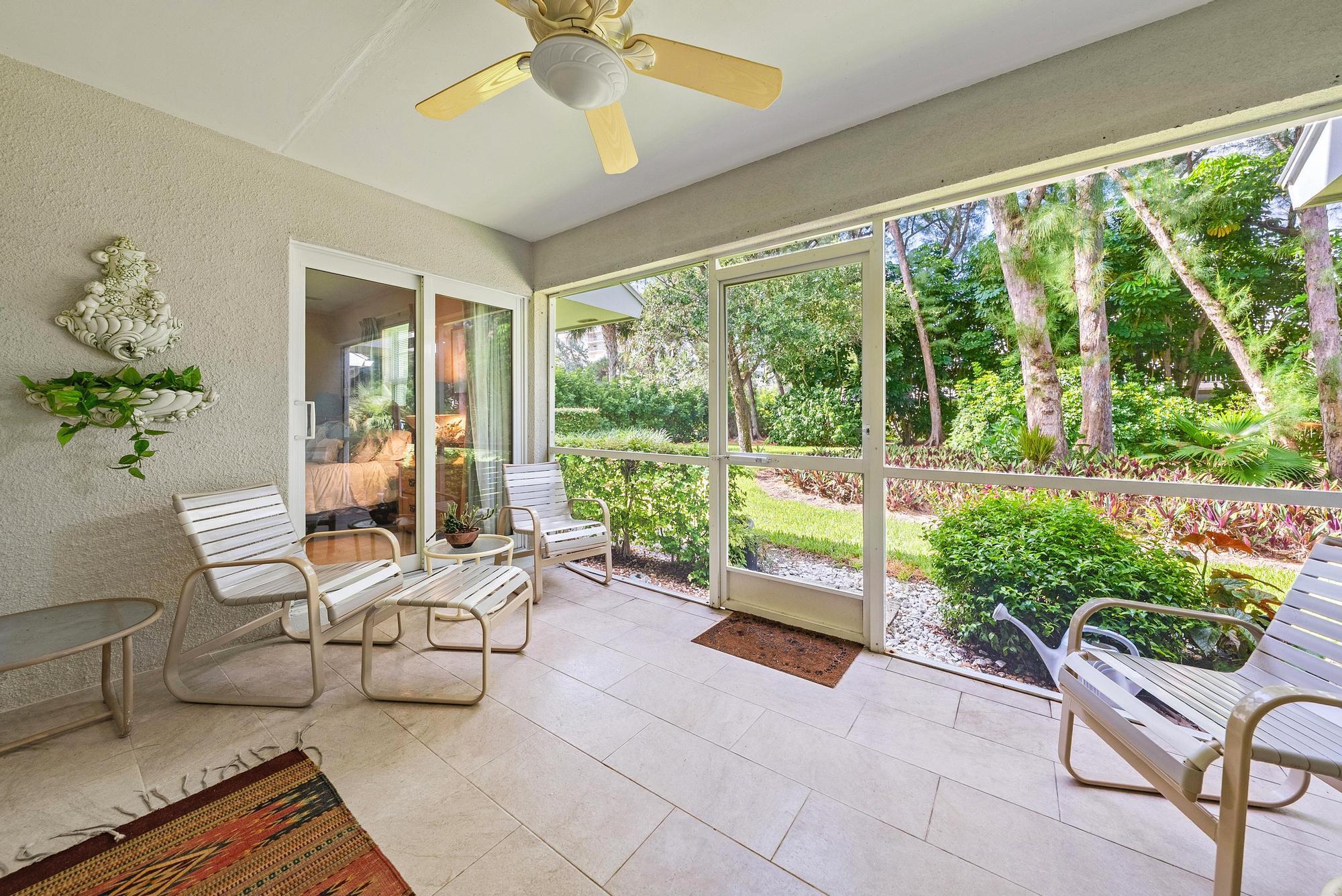 Enjoy all the space in this true 3-bedroom 3 bath PLUS a separate family room, one of the largest units in the complex. With all this space it feels like your own house by the beach, this is a corner unit on the first floor, you have a tranquil garden view and privacy. The large screened in porch is perfect for enjoying the Florida weather while relaxing in nature. With deeded access to the beach, you're just a short walk from the beautiful blue water, and white sandy beach. You will never run out of things to do at Sugar Sands, Large pool, great clubhouse with lots of activities, tennis, pickleball, shuffleboard.