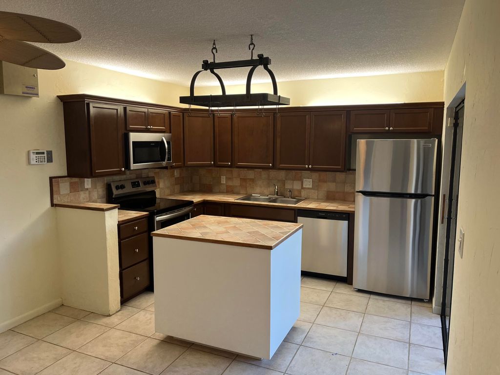 Photo of 1510 15th Court, Palm Beach Gardens, FL 33410 (MLS # R10857292)