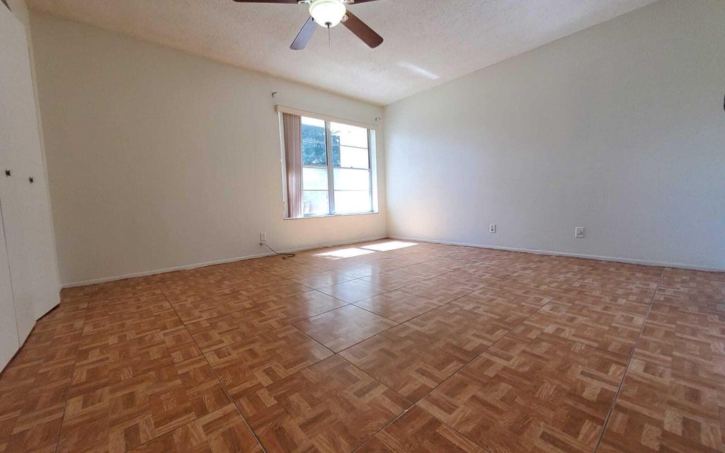 Photo of 12003 Poinciana Boulevard #204, Royal Palm Beach, FL 33411 (MLS # R11162412)