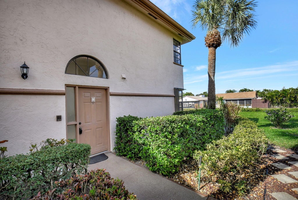 Photo of 5195 Europa Drive #M, Boynton Beach, FL 33437 (MLS # B26089405)