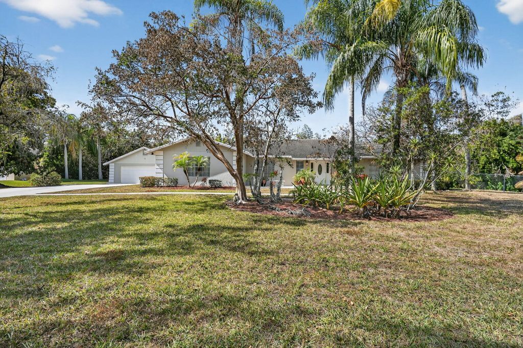 Photo of 15315 78th Drive N, Palm Beach Gardens, FL 33418 (MLS # R11162767)