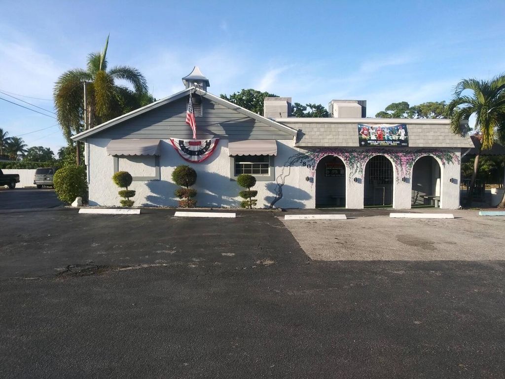 Photo of 3801 10th Avenue N, Palm Springs, FL 33461 (MLS # R10929892)