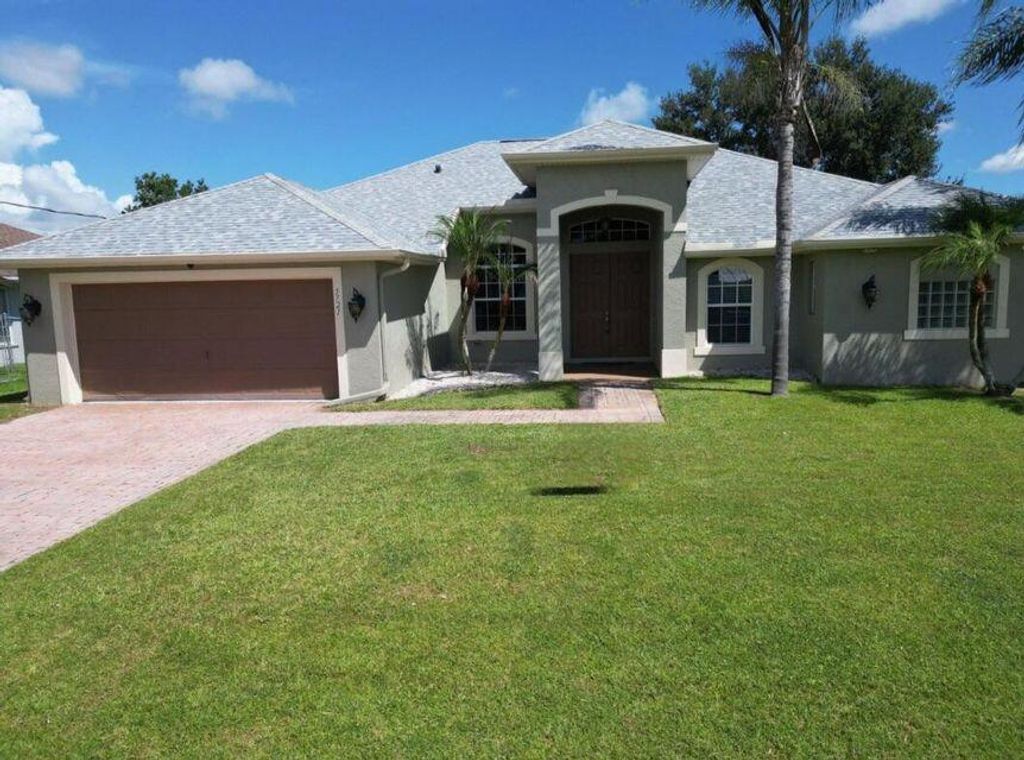 Photo of 5721 NW Alcazar Terrace, Port Saint Lucie, FL 34986 (MLS # R11157497)