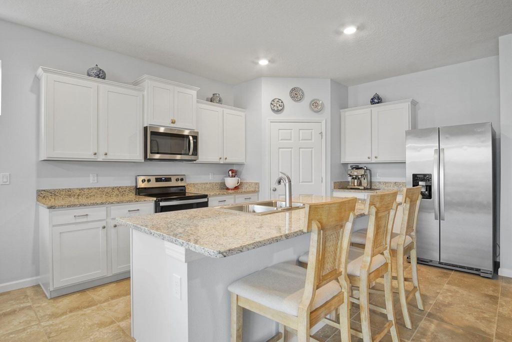 Photo of 10568 SW Cambria Lane, Port Saint Lucie, FL 34987 (MLS # R11128863)