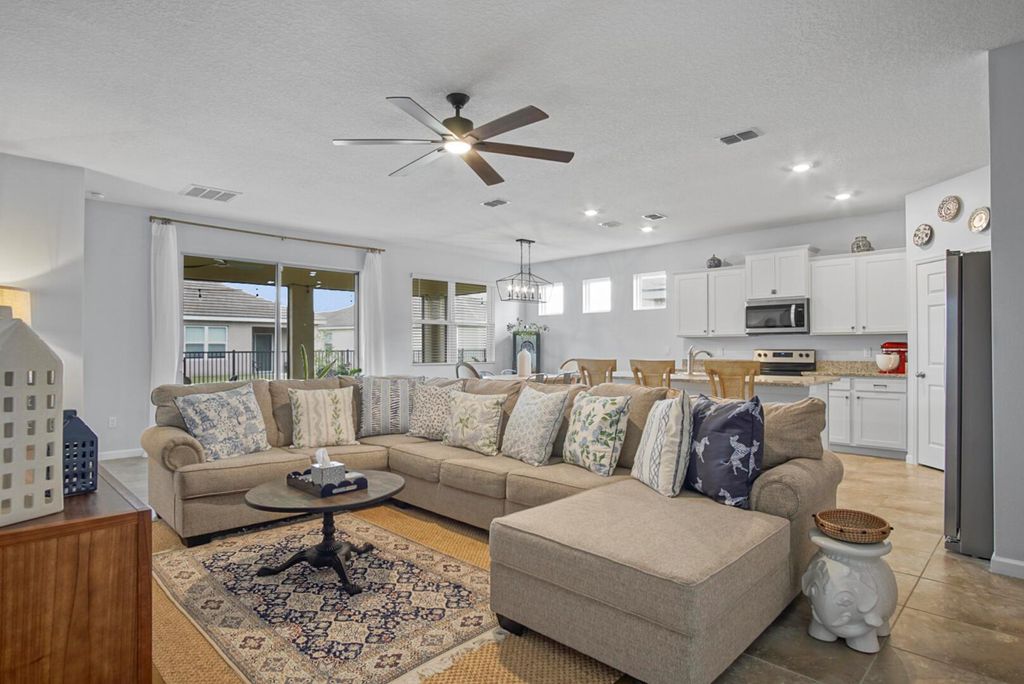 Photo of 10568 SW Cambria Lane, Port Saint Lucie, FL 34987 (MLS # R11128863)