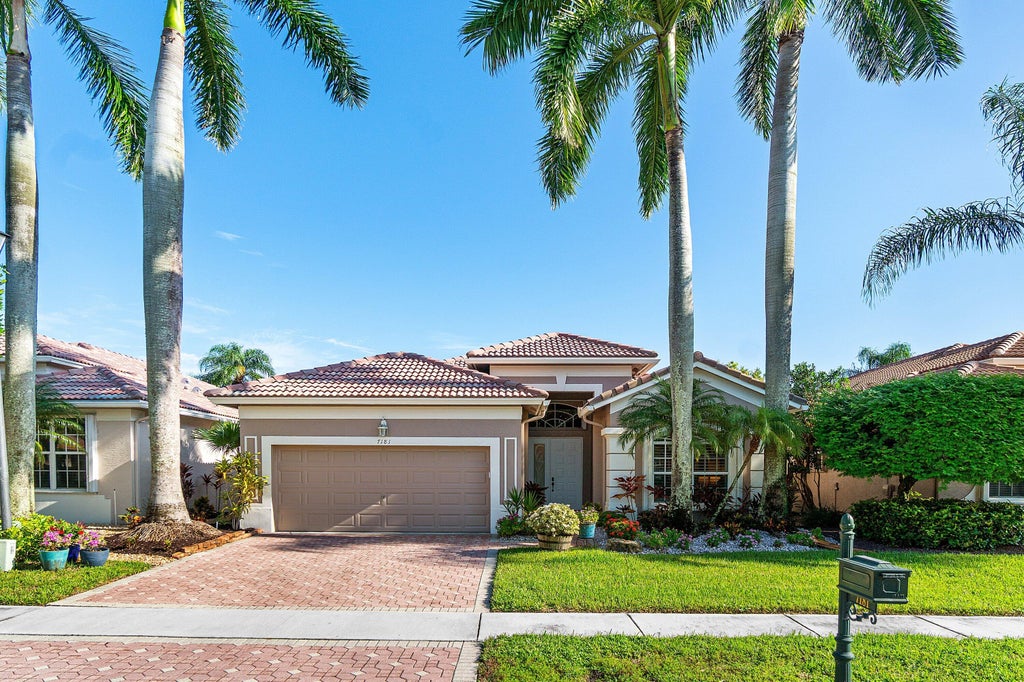 Photo of 7181 SOUTHPORT Drive, Boynton Beach, FL 33472 (MLS # B26088136)