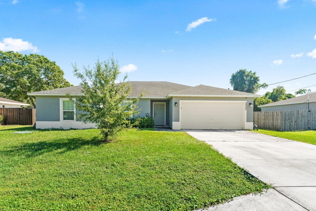 Photo of 2333 SE Aneci Street, Port Saint Lucie, FL 34984 (MLS # R11137570)