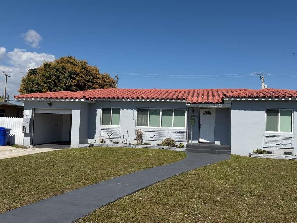 Photo of 2815 Van Buren St, Hollywood, FL 33020 (MLS # F10551840)