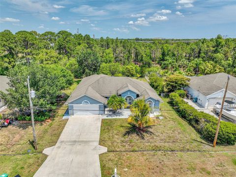 Photo of 6107 NW Gause Ave, Port Saint Lucie, FL 34986 (MLS # F10529026)