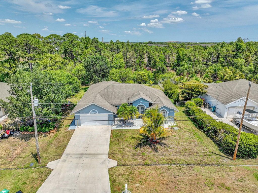 Photo of 6107 NW Gause Avenue, Port Saint Lucie, FL 34986 (MLS # F10529026)