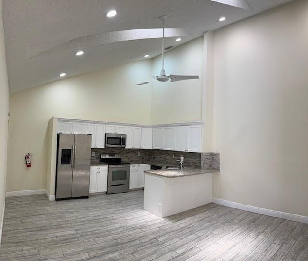 Photo of 1312 Periwinkle Place, Wellington, FL 33414 (MLS # R11091558)