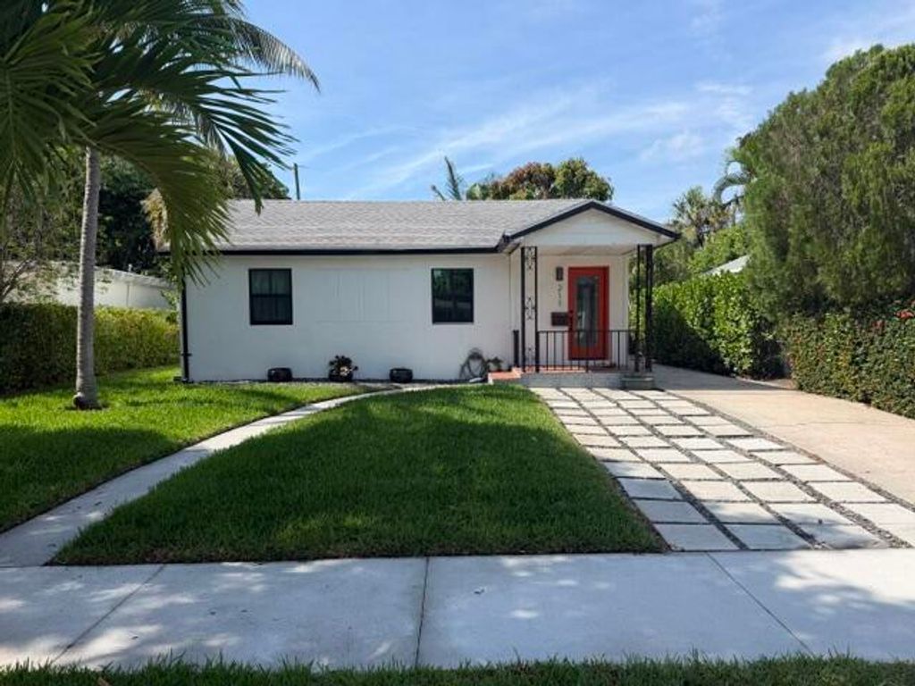 Photo of 211 Princeton Drive, Lake Worth Beach, FL 33460 (MLS # B26027991)