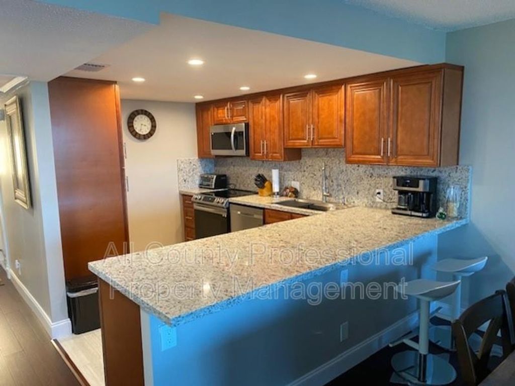 Photo of 3051 N Course Drive #901, Pompano Beach, FL 33069 (MLS # F10556595)