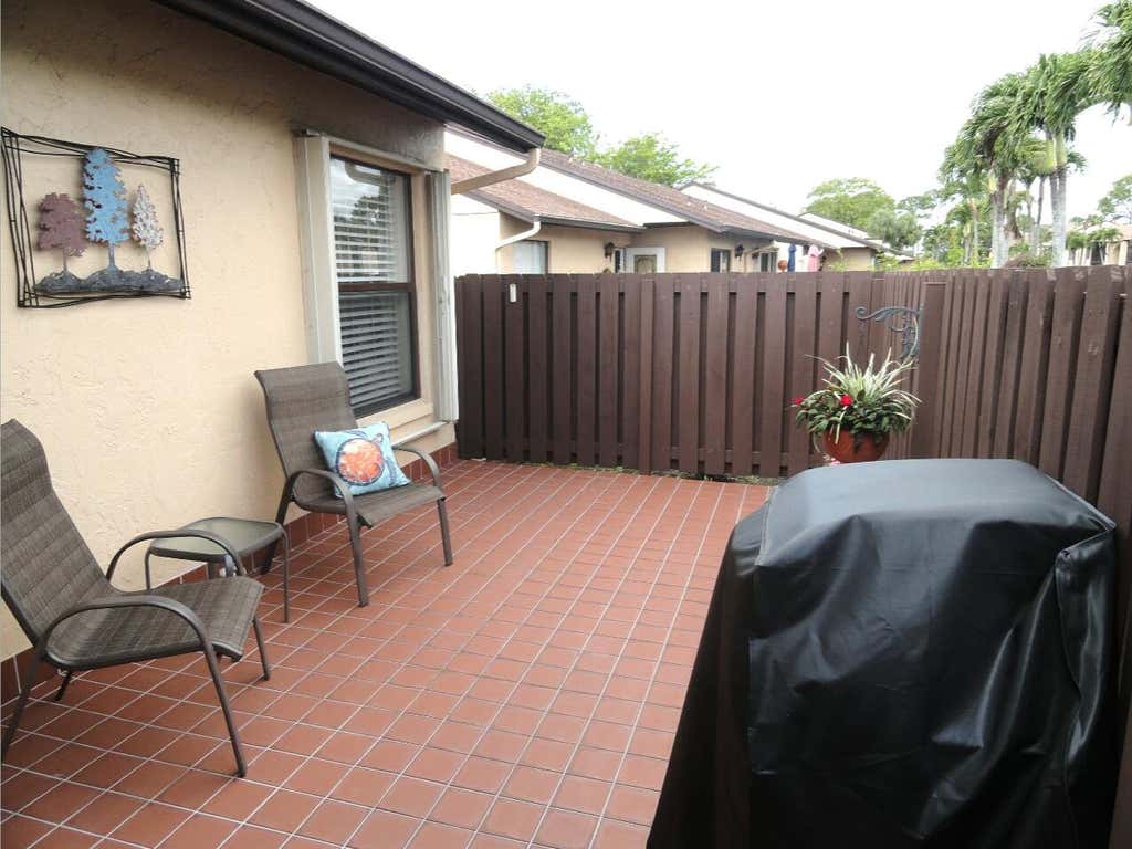 Photo of 808 Sky Pine Way #F, Greenacres, FL 33415 (MLS # R10971062)