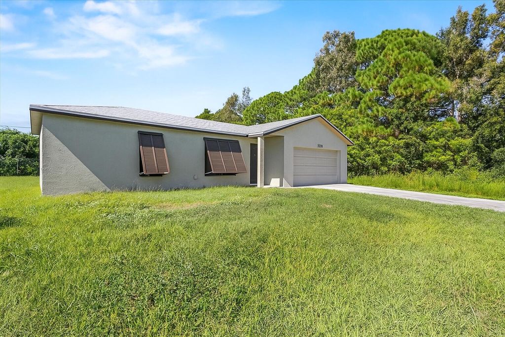 Photo of 2174 SW Larchmont Lane, Port Saint Lucie, FL 34984 (MLS # R11136974)