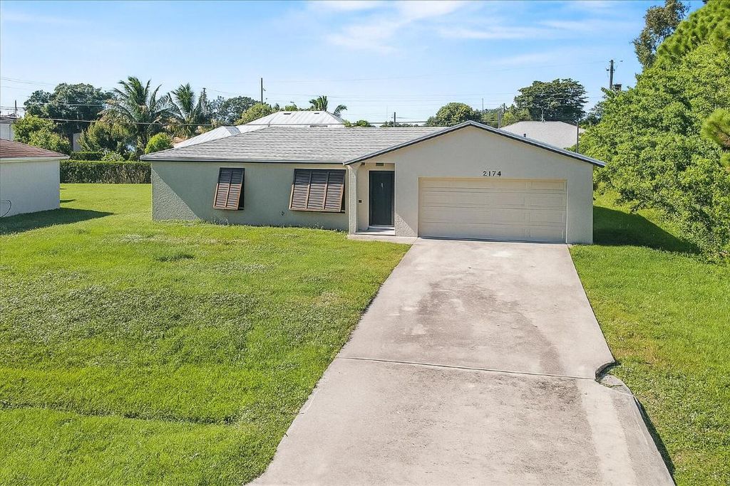 Photo of 2174 SW Larchmont Lane, Port Saint Lucie, FL 34984 (MLS # R11136974)