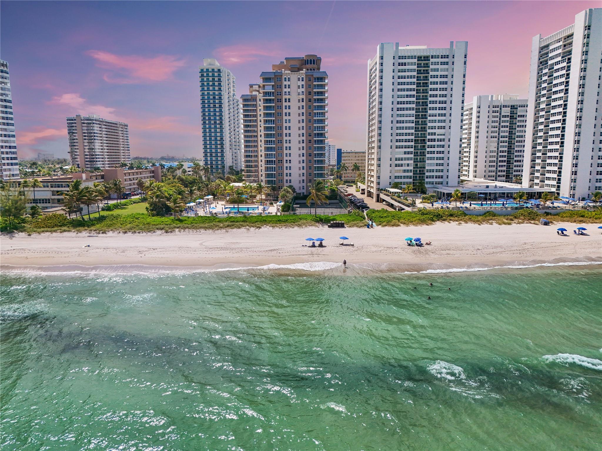 Experience Coastal Luxury Living
Welcome to Unit 10B at 1912 South Ocean Drive – a stunning residence designed for those who desire the very best in oceanfront living. This beautifully appointed home boasts freshly renovated floors that bring a modern elegance throughout, paired with updated appliances that blend style and functionality.
Wake up each day to sweeping ocean views, with the beach just steps away, offering the perfect blend of tranquility and sophistication. The open and airy layout is enhanced by natural light that highlights every detail of this thoughtfully upgraded space. Perfect Privacy as each resident floor only has two units.
With direct beach access, resort-style amenities, and an unbeatable location, this residence is the epitome of South Florida luxury living.