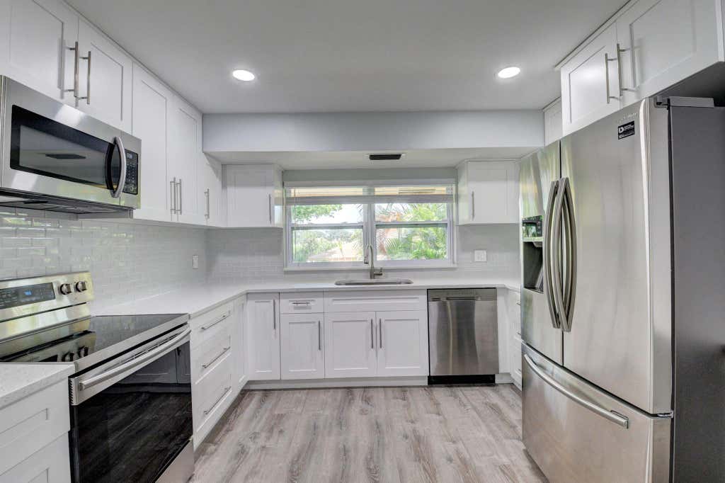 Photo of 5566 Queen Palm Court #D, Delray Beach, FL 33484 (MLS # R10920710)