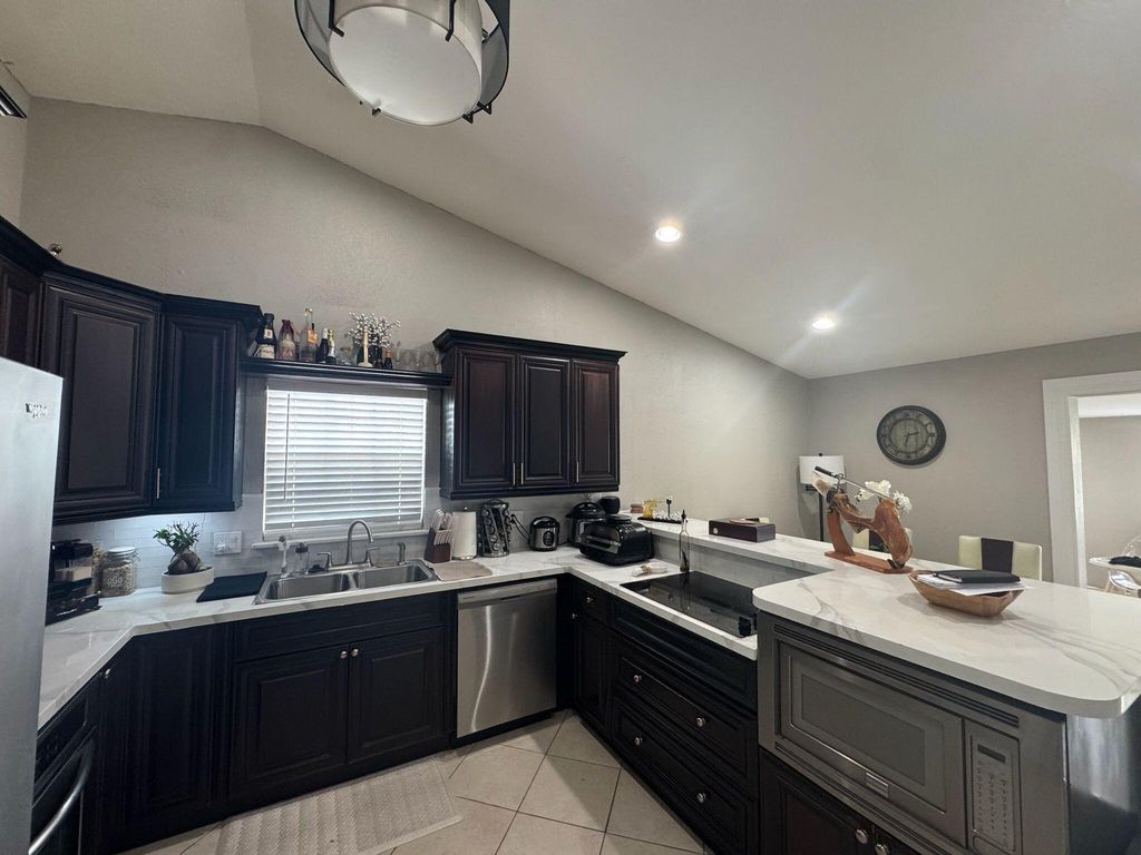 Photo of 7779 Elwood Dr, Lake Worth, FL 33467 (MLS # R11122411)