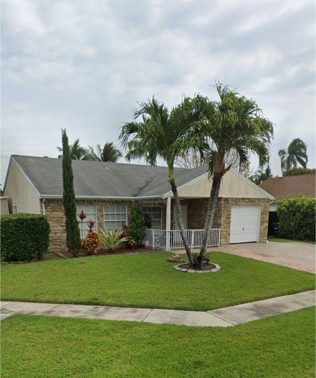 Photo of 7779 Elwood Dr, Lake Worth, FL 33467 (MLS # R11122411)
