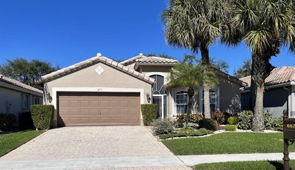 Photo of 6571 Sherbrook Drive, Boynton Beach, FL 33437 (MLS # R10773466)