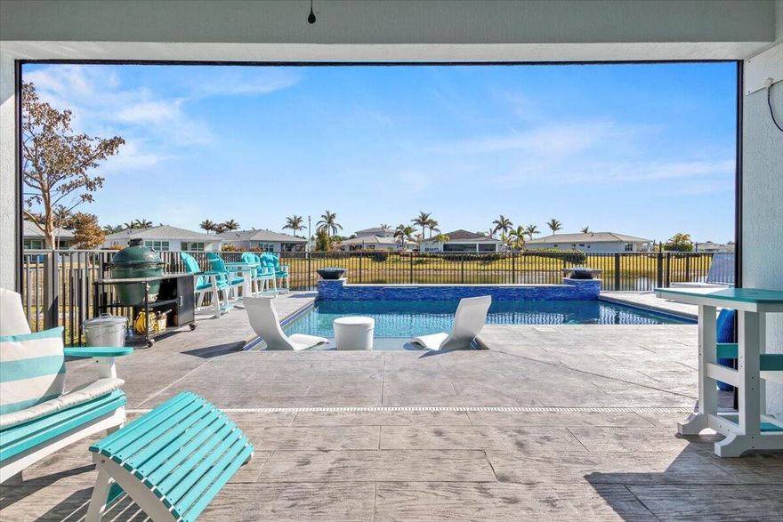 This comfortable, contemporary home in the heart of Tradition has  numerous upgrades from concrete tile roof, whole house Generac generator, to the remote porch screen for storms & privacy ,  the ring doorbell & cameras, and the durable epoxy finished garage floor. Many more features are listed in the document section. The extras set this home apart from the standard build.  Then there is the  pool setting ,the main attraction, with a view over the water and the fire water bowls for that tropical sensation. Umbrella stand  + chairs are yours, so bring your plastic glass and favorite drink! It will be warm soon, meanwhile the pool can be  heated until temperatures rise.  The den can be made easily in to a 3rd bedroom. Measurements approx., rules and regs in document. HOA offers a dog park!