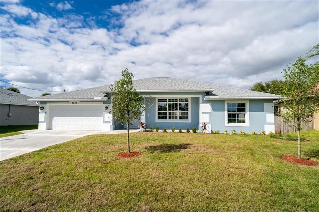 Photo of 2326 SW Wynnewood Street, Port Saint Lucie, FL 34953 (MLS # R10759031)