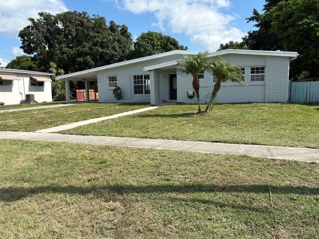 Photo of 148 NE Estia Lane, Port Saint Lucie, FL 34983 (MLS # R11106025)