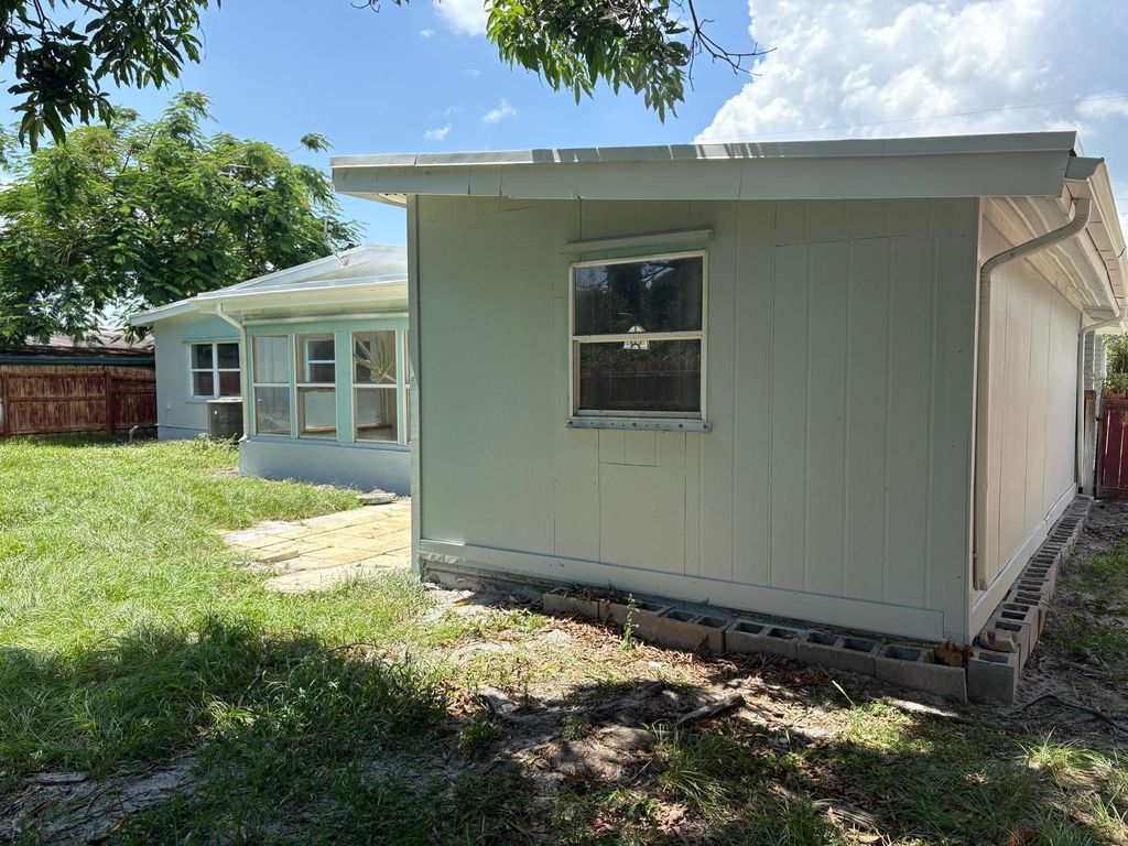 Photo of 148 NE Estia Lane, Port Saint Lucie, FL 34983 (MLS # R11106025)