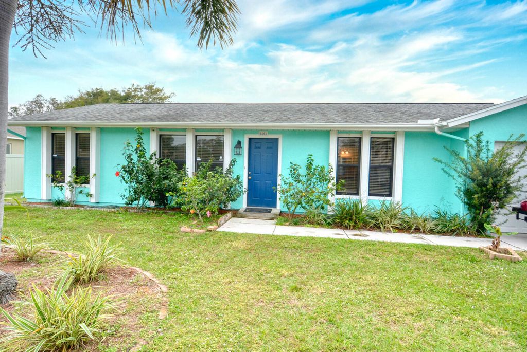 Photo of 2456 SE Rival Avenue, Port Saint Lucie, FL 34952 (MLS # R10949391)