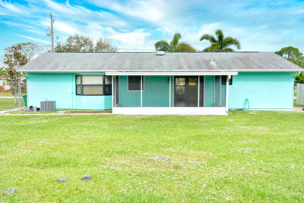 Photo of 2456 SE Rival Avenue, Port Saint Lucie, FL 34952 (MLS # R10949391)